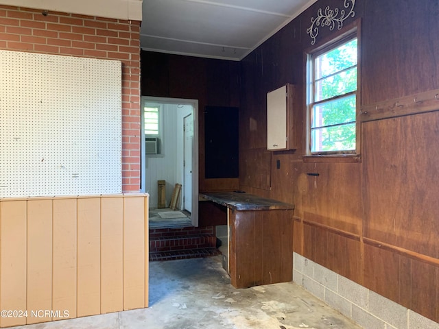 bathroom with concrete floors and cooling unit