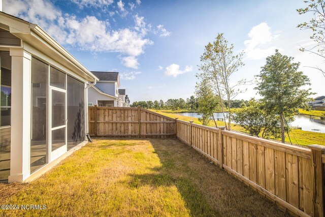 view of yard featuring a water view