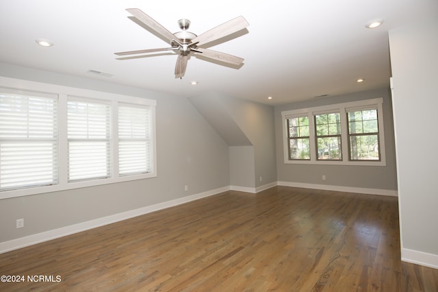 bonus room featuring ceiling fan and dark hardwood / wood-style flooring