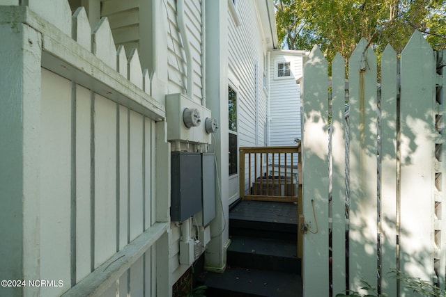 view of property exterior with a deck