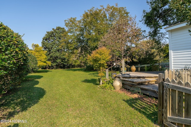 view of yard featuring a deck