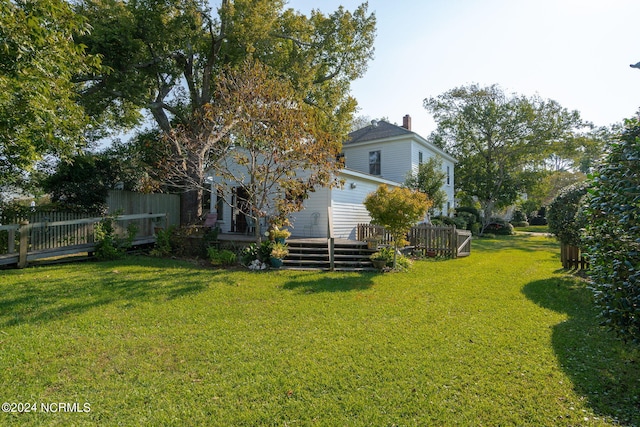 view of yard featuring a deck