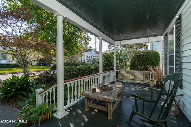 wooden terrace with covered porch