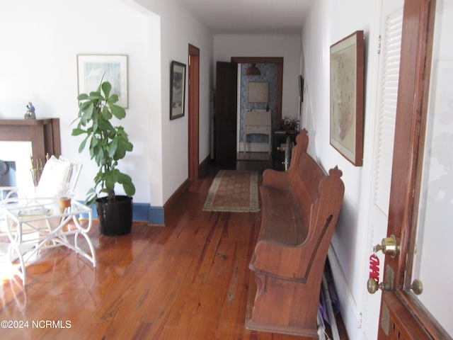 hallway featuring dark wood-type flooring