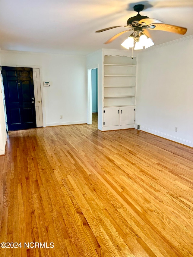 interior space with ceiling fan and light hardwood / wood-style flooring