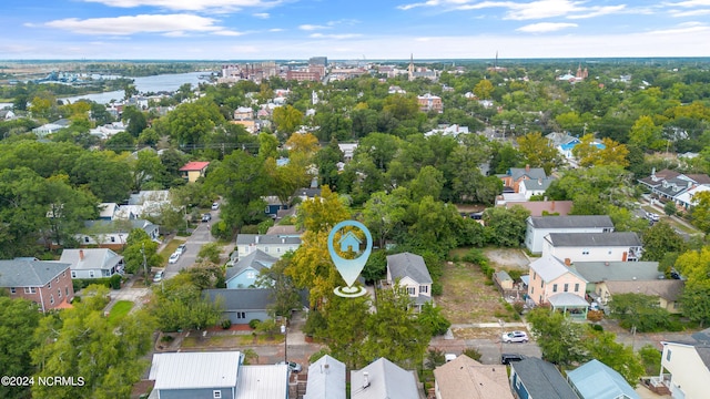 birds eye view of property featuring a water view and a residential view