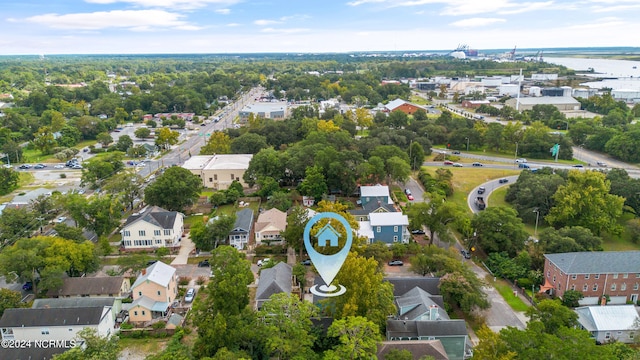 birds eye view of property featuring a water view and a residential view