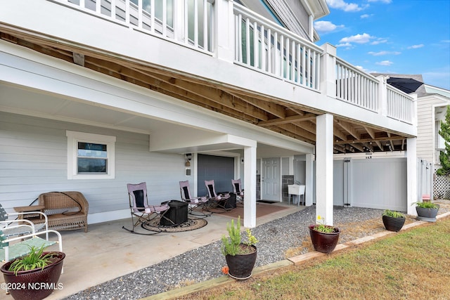 view of patio with a fire pit