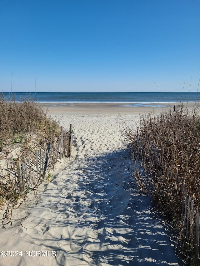 view of water feature featuring a beach view