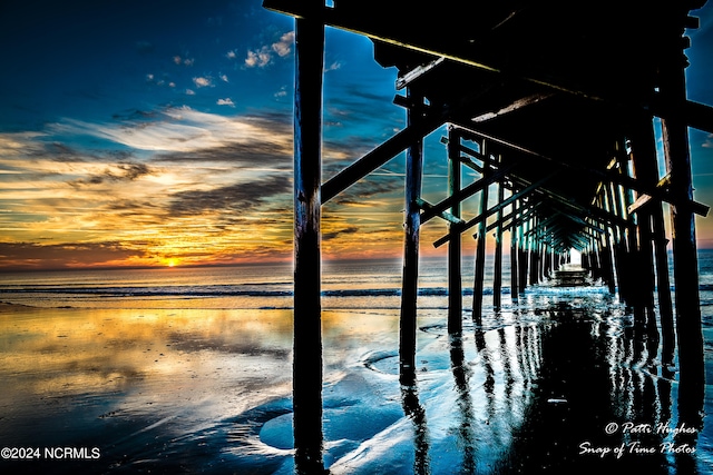 property view of water featuring a beach view