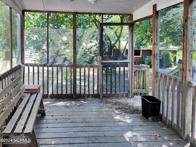 unfurnished sunroom featuring plenty of natural light