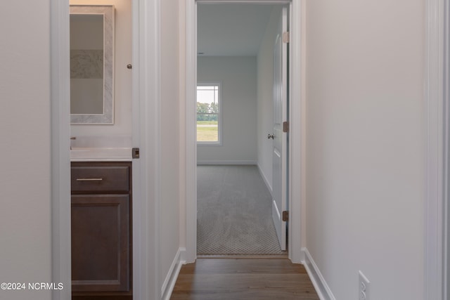 hallway featuring light hardwood / wood-style flooring