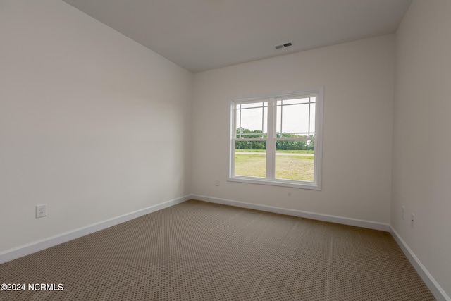 unfurnished room featuring carpet floors