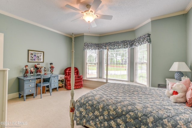 bedroom featuring a textured ceiling, ornamental molding, ceiling fan, and light colored carpet