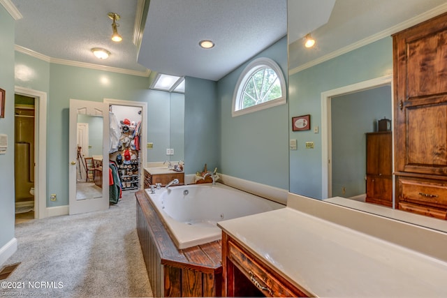 bathroom featuring a textured ceiling, ornamental molding, tiled bath, and toilet