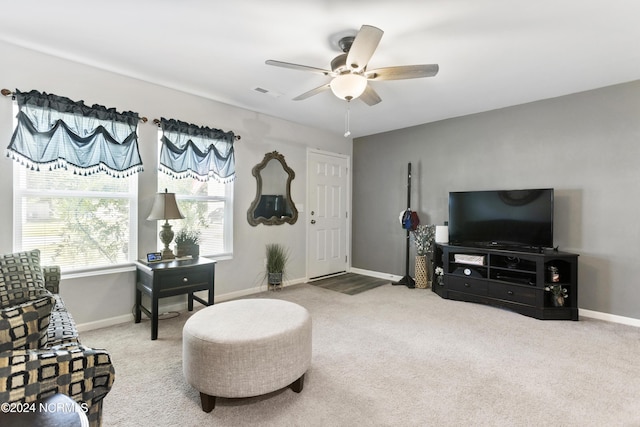 sitting room featuring carpet, visible vents, and baseboards