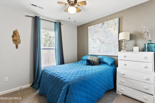 bedroom with a ceiling fan, carpet, visible vents, and baseboards