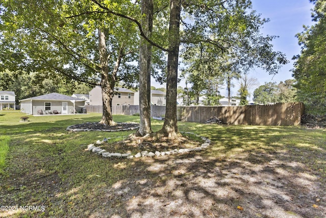 view of yard with fence