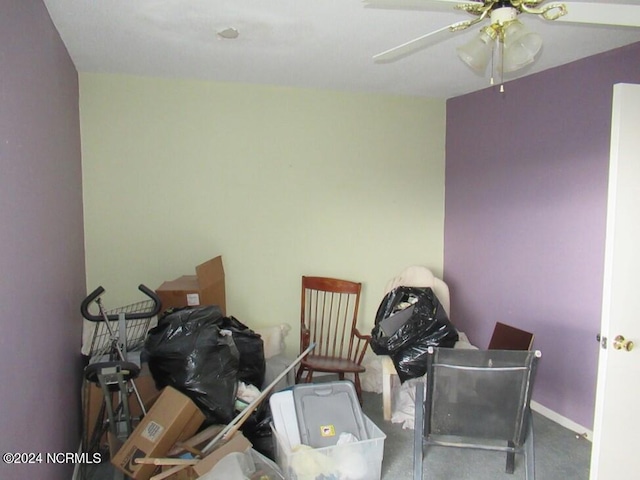 interior space featuring ceiling fan