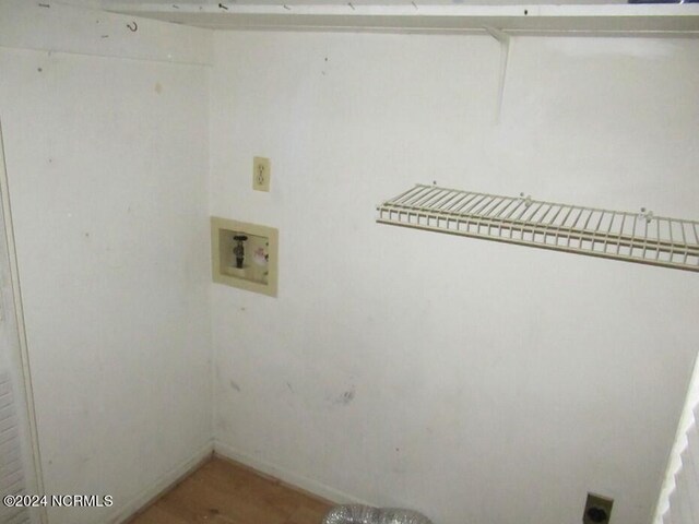 laundry room featuring hookup for a washing machine and electric dryer hookup