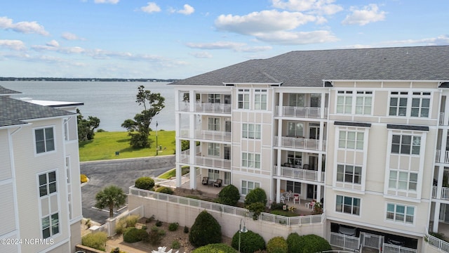 view of building exterior featuring a water view