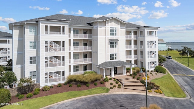 view of building exterior featuring a water view