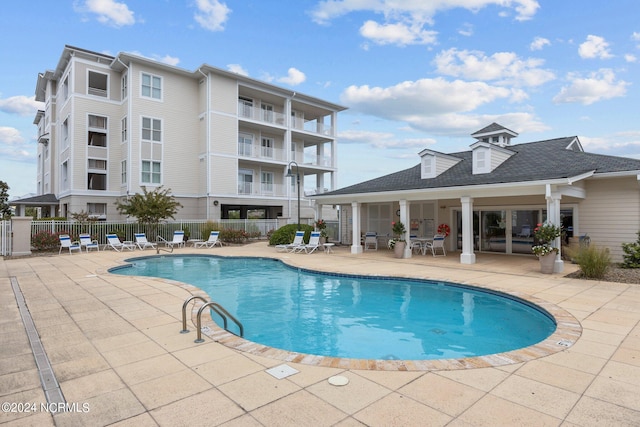 view of pool featuring a patio area