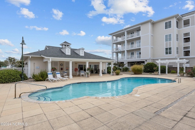 view of pool featuring a patio area