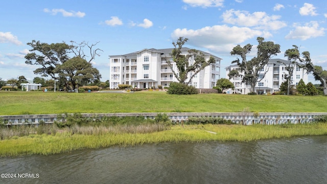 view of property with a water view