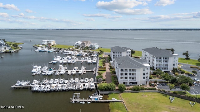 birds eye view of property featuring a water view