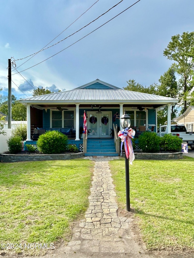 view of front of house featuring a front lawn and a porch