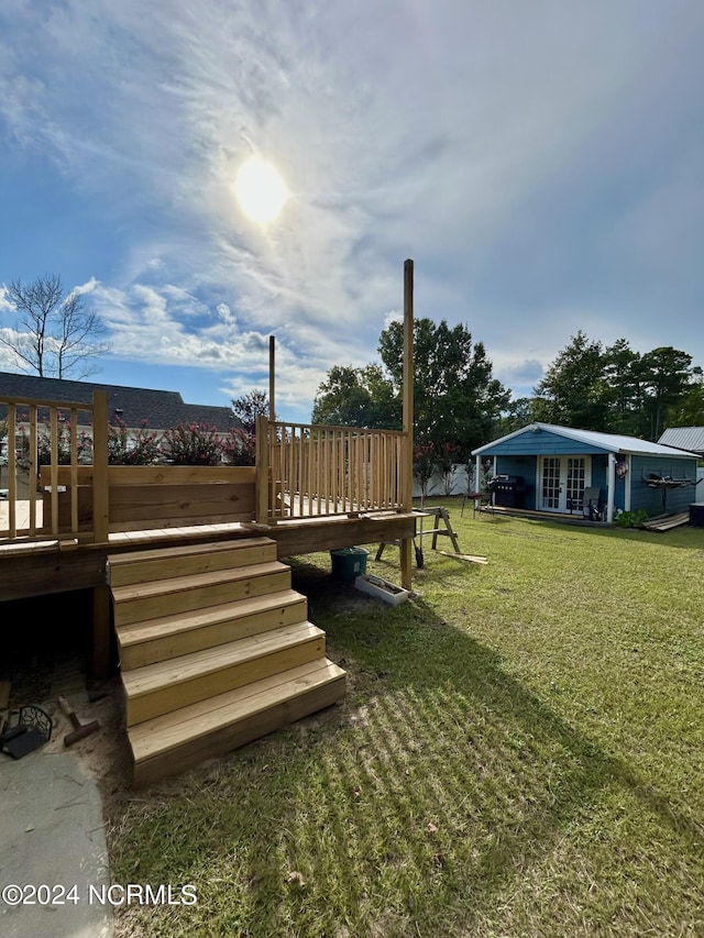 view of yard with a wooden deck