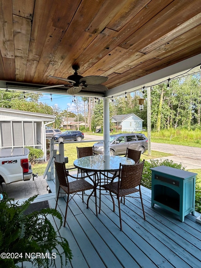 wooden terrace with ceiling fan