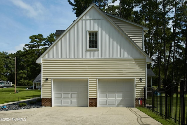 garage featuring fence