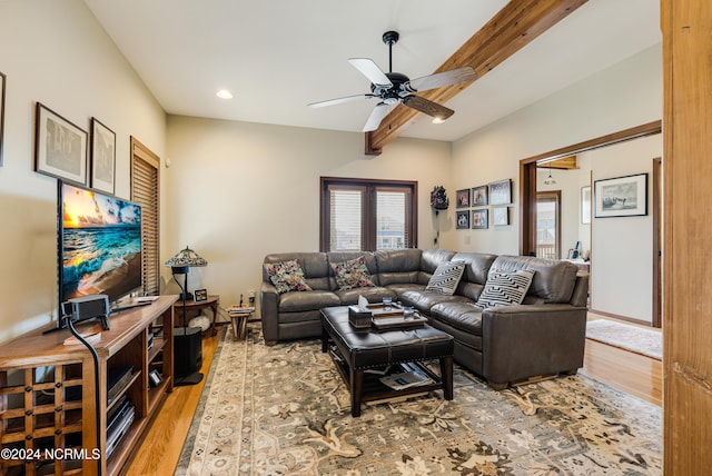 living room featuring recessed lighting, ceiling fan, wood finished floors, beamed ceiling, and baseboards