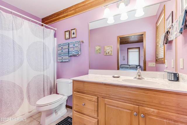 bathroom featuring curtained shower, toilet, vanity, tile patterned flooring, and beamed ceiling