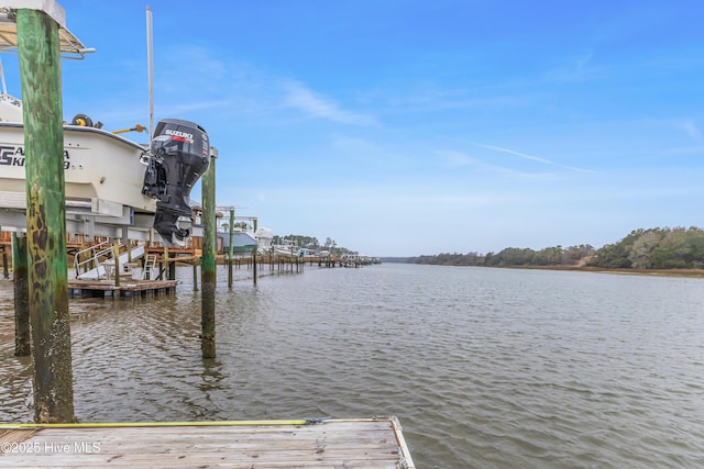 dock area with a water view