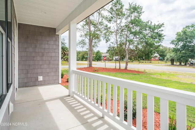 balcony featuring covered porch