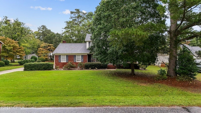 view of front of house with a front lawn