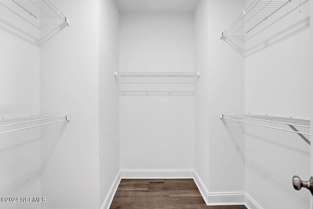 5104 Boss Ct SE, Southport, NC 28461 - walk in closet with wood finished floors