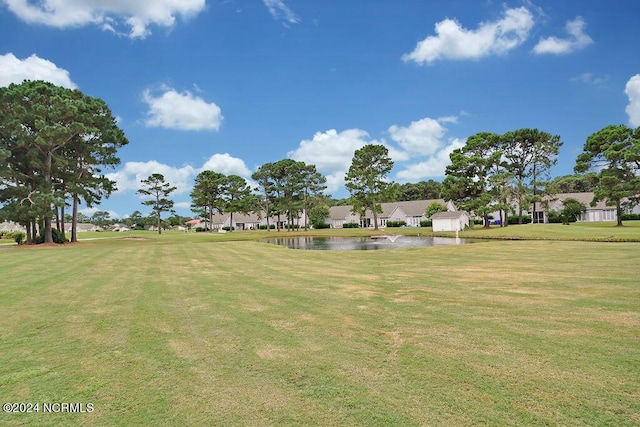 5104 Boss Ct SE, Southport, NC 28461 - view of property's community with a water view, a yard, and a residential view