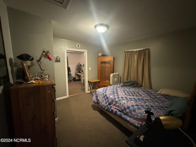 carpeted bedroom featuring a closet