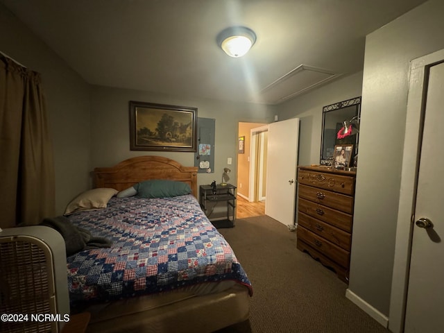 bedroom with dark carpet