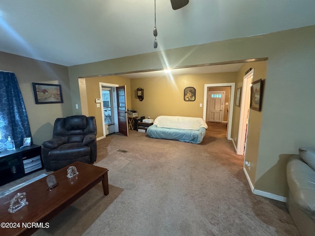 carpeted bedroom featuring ceiling fan