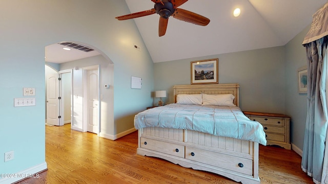 bedroom featuring high vaulted ceiling, ceiling fan, and light hardwood / wood-style flooring