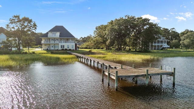 dock area with a water view