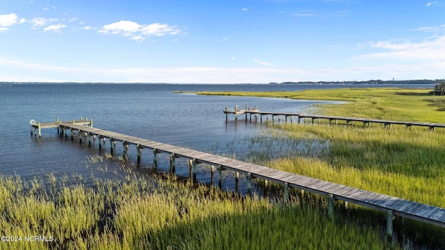 dock area featuring a water view