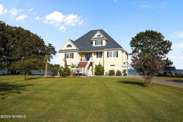 view of front of home with a front yard