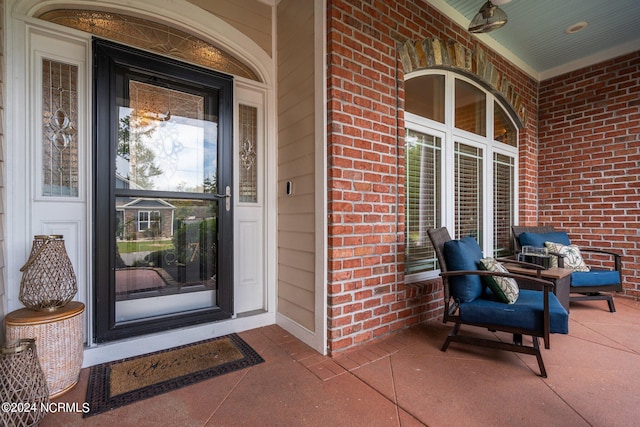 property entrance featuring covered porch