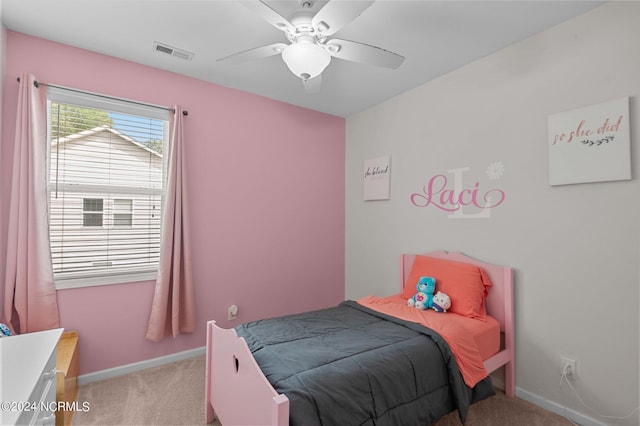 carpeted bedroom featuring ceiling fan